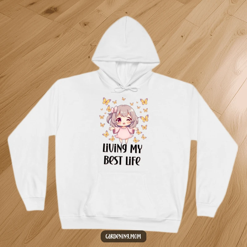 Funny Hoodie: Character with outstretched hands amidst fluttering butterflies, a comfortable and funny gift of natural beauty.