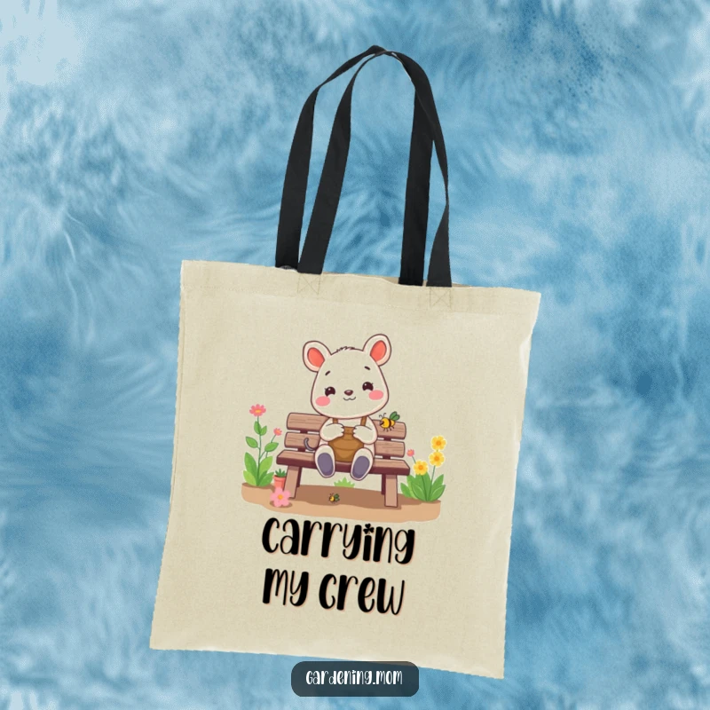 Funny gardening animal tote bag: a cheerful critter sits on a garden bench, happily admiring a small bug, perfect for carrying items with a smile.